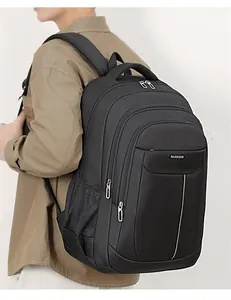 Detailed side view of a large capacity black Oxford cloth backpack for men's travel
