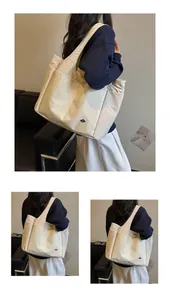 Multi-pocket large capacity Oxford cloth tote bag shown from multiple angles in a lifestyle setting.