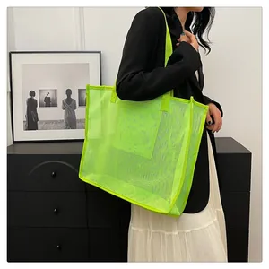 Bolso de malla verde neón grande en modelo ideal para la playa compras y gimnasio