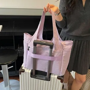 Large capacity lavender nylon travel tote bag with convenient luggage trolley sleeve