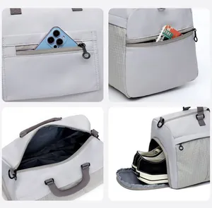 Detailed views showing the shoe compartment and side pockets of the grey travel bag.