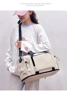 Model carrying a stylish beige large capacity travel bag for gym and short trips