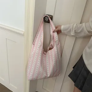 Fresh pink and white striped shoulder tote bag with cute bow patterns for daily students