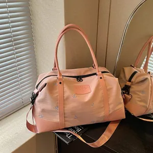 Large capacity pink travel bag for women with expandable storage and wet-dry separation