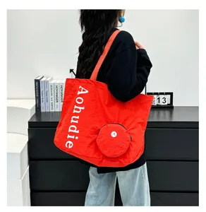 Stylish large red washed cloth tote bag for women showing causal shopping style