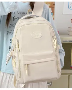 Minimalist cream-colored student school backpack with waterproof fabric and grid texture