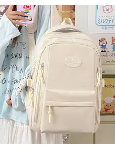Close-up of minimalist beige grid-pattern student backpack in a pastel aesthetic setting