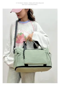 Sage green travel bag with dry-wet separation shown on a female model outdoors