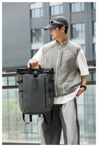 Casual water-resistant Oxford cloth backpack for men in an urban outdoor setting