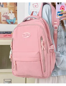 Detail showing the pink large-capacity school backpack in a simple Japanese aesthetic