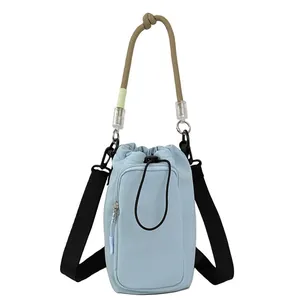 Lightweight light blue dopamine water bottle bag with rope handle for outdoor cycling
