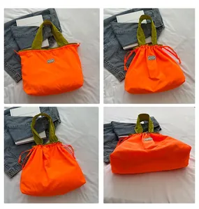 Multi-angle views of orange drawstring bag showing flat and cinched styles