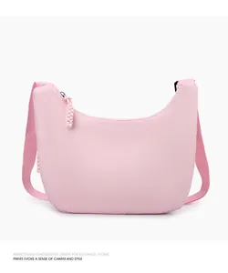 Fashionable minimalist pink oxford nylon crescent shoulder bag for women, studio view.