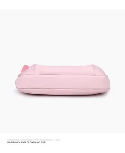 Detailed bottom view showing the reinforced base of a pink Oxford crossbody bag