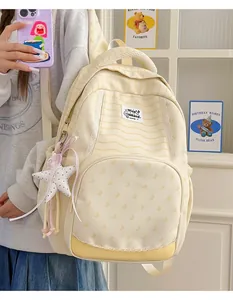 Large capacity cream yellow striped school backpack featuring star charm and lace detail