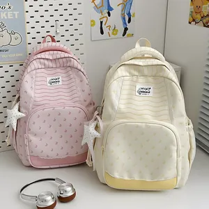 Large capacity striped student backpack with butterfly pattern and star pendant charm