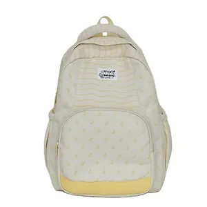 Cream-colored lightweight student backpack with yellow stripes and butterfly prints.