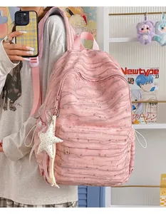 Chic pink tie-dye backpack for students with large capacity and star accessory.