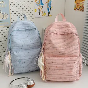 Stylish large capacity tie-dye school backpacks for students in pink and blue colors