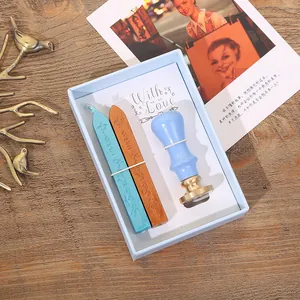 Vintage retro wax seal stamp set gift box with light blue handle and two sealing wax sticks