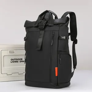 Large capacity waterproof black oxford cloth backpack for men with roll-top design.