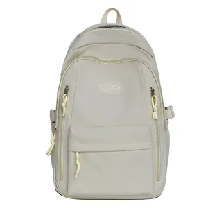 Minimalist beige water-repellent school backpack for high school girls and students