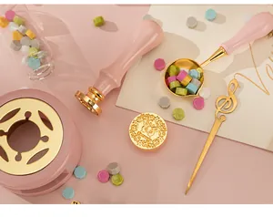 Vintage macaron pink wax seal stamp kit with butterfly pattern and melting furnace