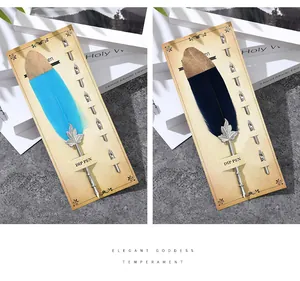 Elegante set di penne a immersione con piume dorate e 5 pennini di ricambio blu e navy