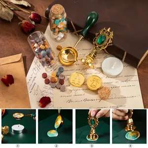 Kit de sellos de lacre vintage con mango de esmeralda y cabezales de latón navideños