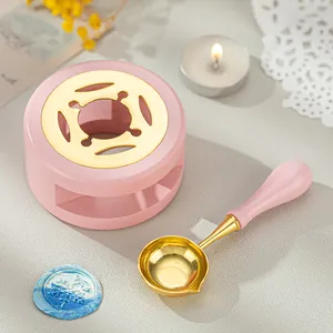 Horno de madera rosa para derretir cera con cuchara dorada para sellos de lacre