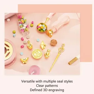 Sakura pink sealing wax stamp set including heater melting spoon and vintage stamp heads
