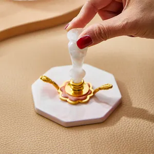 Elegante molde octogonal para sellos de lacre con centro decorativo de metal dorado