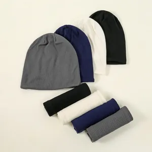 Group view of knitted beanie and neck warmer sets in four assorted winter colors