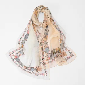 Detailed view of lightweight georgette scarf with elegant floral print border