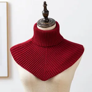 Close-up of a premium dark red knitted ribbed turtleneck fake collar displayed on mannequin.