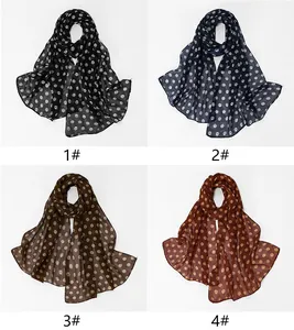 Collection of four elegant chiffon polka dot scarves for women shown in various colors