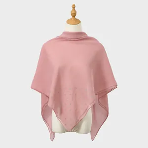 Detail of pink chiffon shawl with sparkling rhinestone floral patterns for women