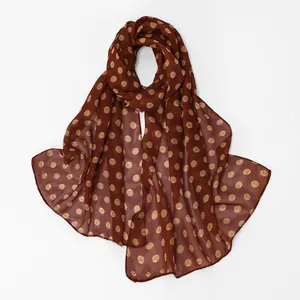 Elegant brown chiffon scarf featuring a stylish yellow polka dot pattern for women's fashion.