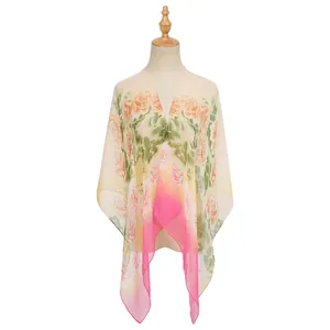 Close-up detail of a sheer georgette shawl featuring elegant floral rose prints