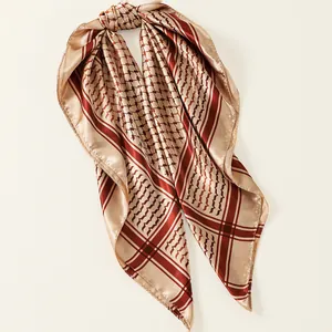 Elegant 90x90cm satin square scarf with burgundy plaid pattern draped on white background.