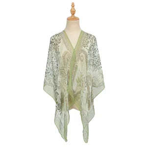 Close-up of lightweight green paisley print georgette shawl scarf for women