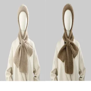 Detailed side-by-side view of beige and brown winter knitted hooded scarves on mannequins