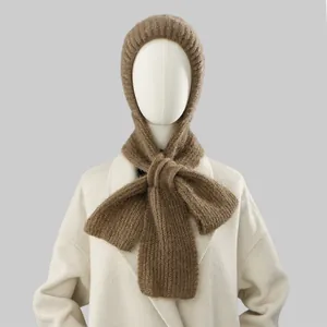 Detailed view of brown squirrel velvet knitted hooded scarf with bow for winter warmth