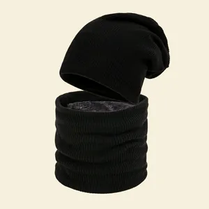 Stylish black knitted beanie hat and neck warmer set with thick warm fleece lining