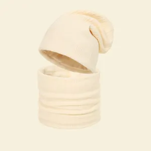 Warm knitted beanie and neck gaiter set in cream for autumn and winter