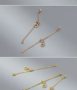 Close-up of S925 sterling silver extender chains with spring clasps and pearl cups.
