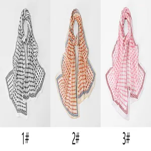 Comparison of three long chiffon scarves with geometric patterns in various colors