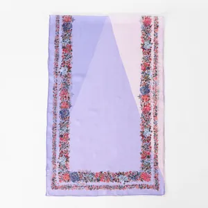 Detailed view of the floral embroidery and pastel color blocking on a georgette shawl