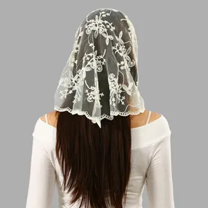 Back view of a white embroidered floral lace bridal veil triangle headscarf accessory