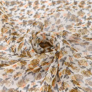Macro detail showing the delicate floral pattern and texture of georgette shawl fabric